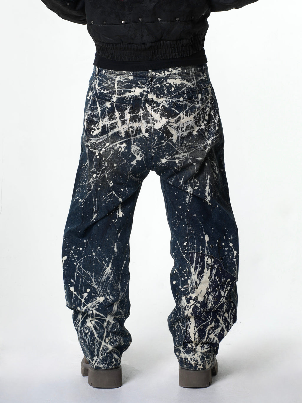 “Relationship“ Printed Splashed Ink Washed Jeans in Blue Denim