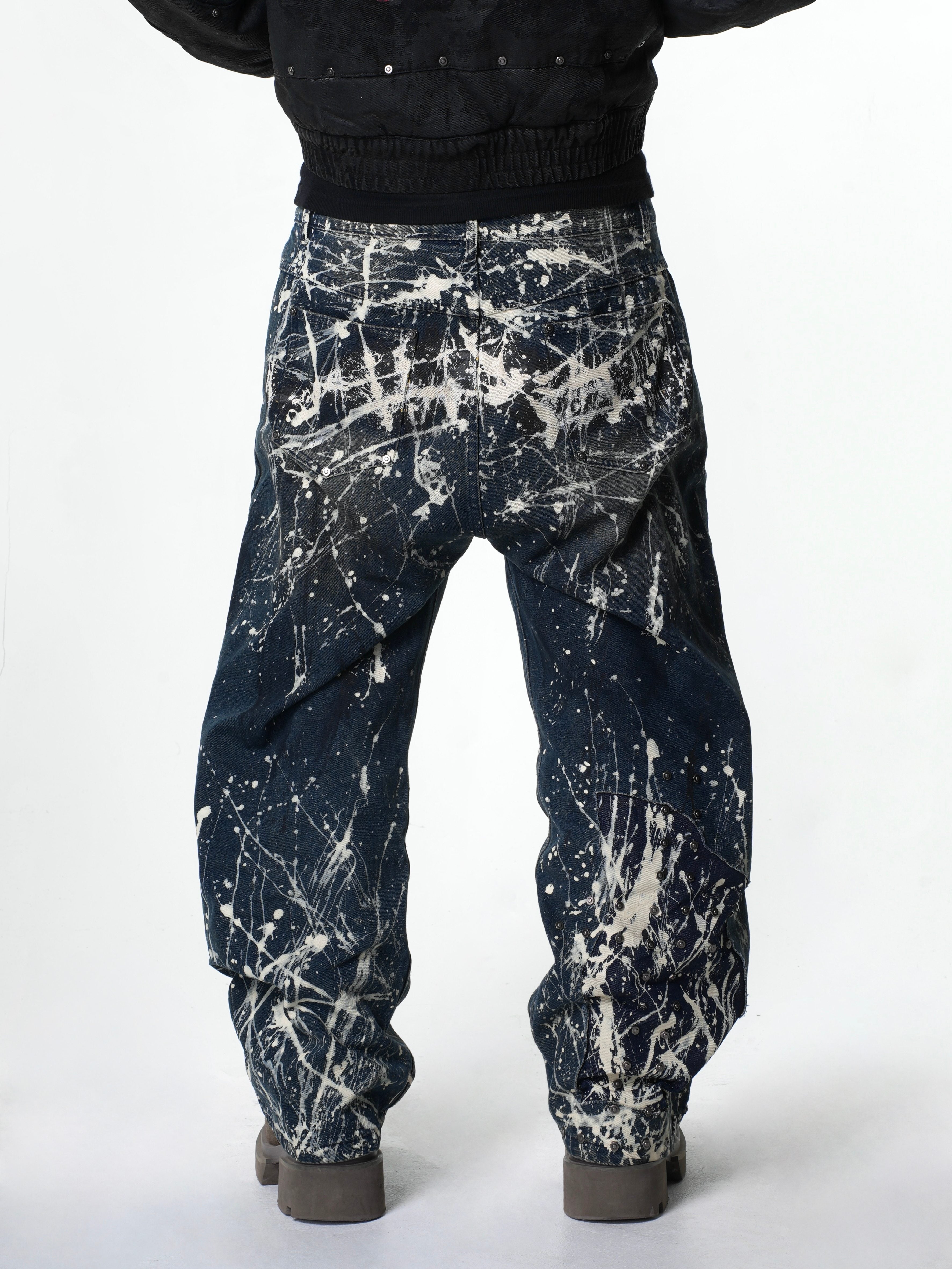 “Relationship“ Printed Splashed Ink Washed Jeans in Blue Denim