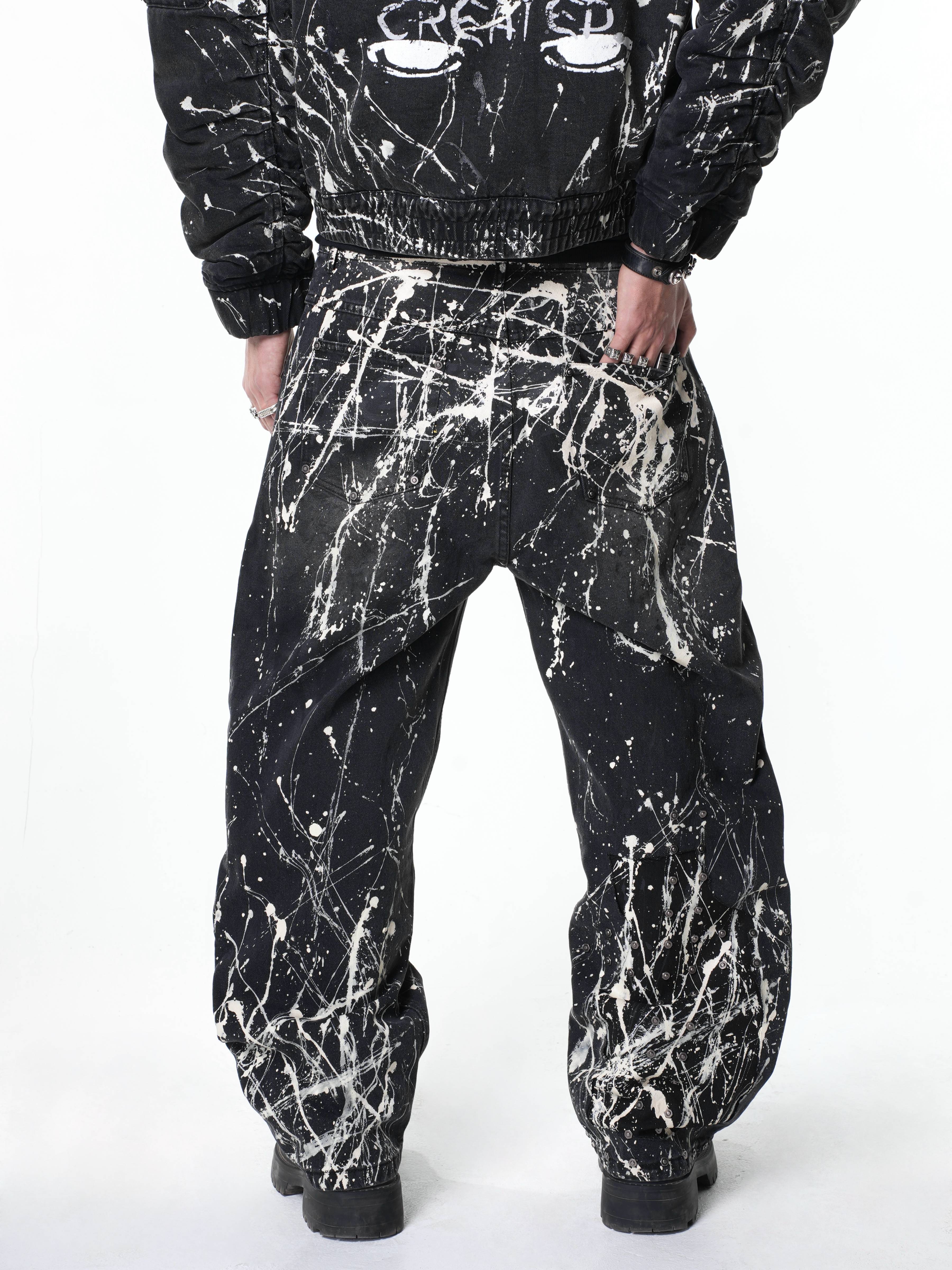 “Relationship“ Printed Splashed Ink Washed Jeans in Black Denim
